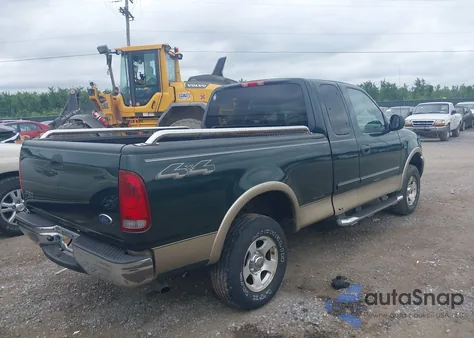 2002 Ford F150 из США, поврежденный, VIN 1FTRX18W02KA29930